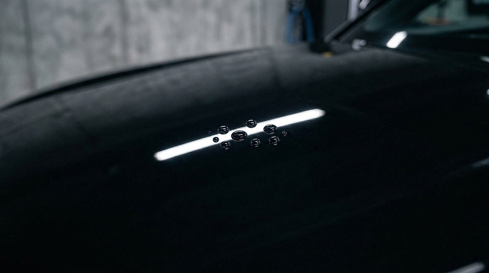 The same paint as a clean mirror finish with water beads