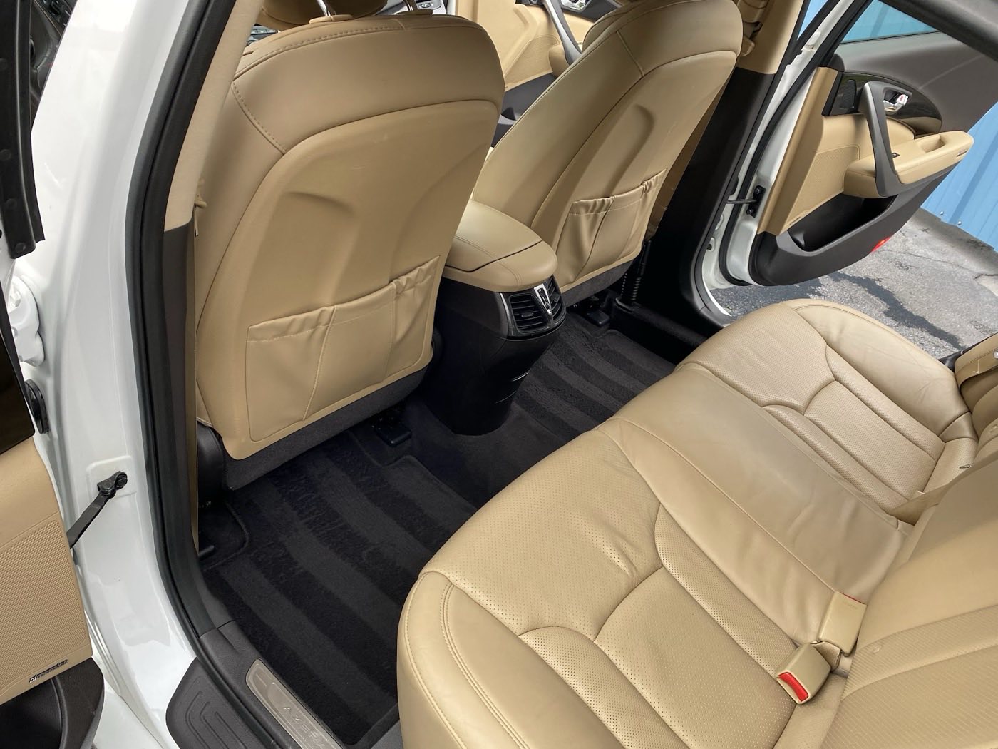 Tan leather back seats after an interior shampoo