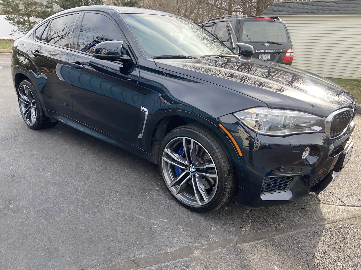 Black BMW X6 M, exterior detailed