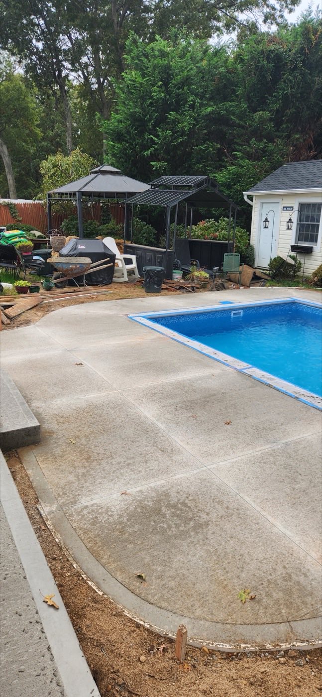 The finished concrete pool deck